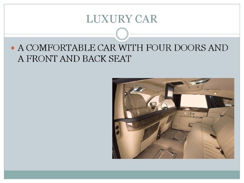 LUXURY CAR A COMFORTABLE CAR WITH FOUR DOORS AND A FRONT AND BACK SEAT